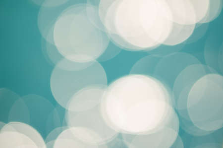 bright colorful sun and sea bokeh backgroundの写真素材