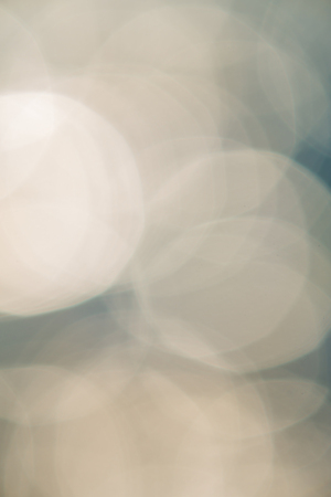 bright colorful sun and sea bokeh backgroundの写真素材