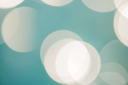 bright colorful sun and sea bokeh backgroundの写真素材