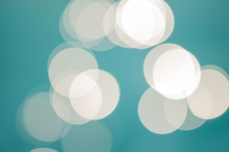 bright colorful sun and sea bokeh backgroundの写真素材