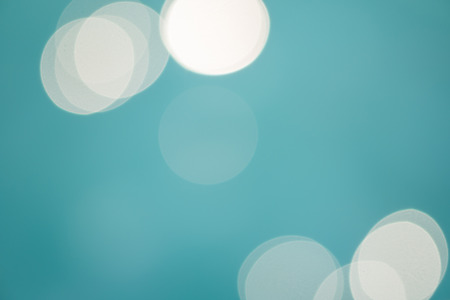 bright colorful sun and sea bokeh backgroundの写真素材