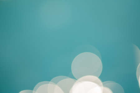 bright colorful sun and sea bokeh backgroundの写真素材