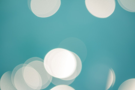 bright colorful sun and sea bokeh backgroundの写真素材