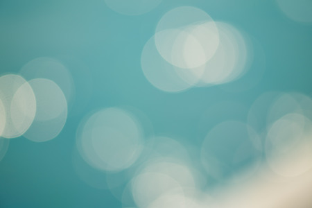 bright colorful sun and sea bokeh backgroundの写真素材