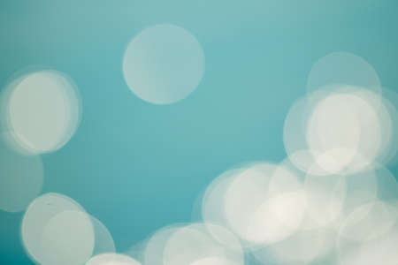 bright colorful sun and sea bokeh backgroundの写真素材