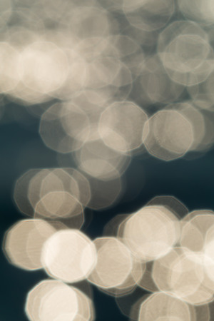 bright colorful sun and sea bokeh backgroundの写真素材