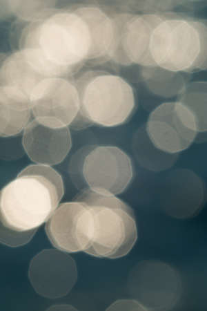 bright colorful sun and sea bokeh backgroundの写真素材