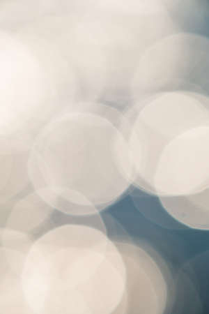 bright colorful sun and sea bokeh backgroundの写真素材