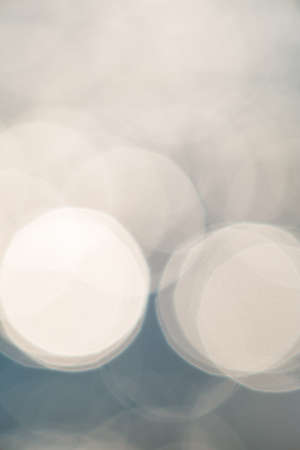 bright colorful sun and sea bokeh backgroundの写真素材