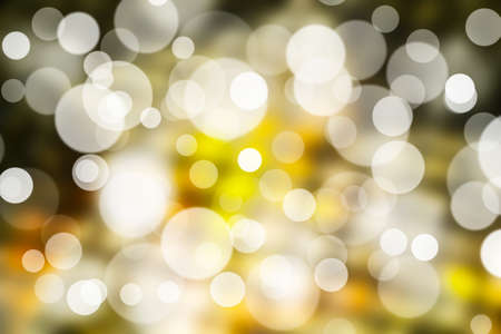 Gold bokeh abstract light background の写真素材