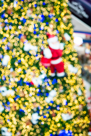 Abstract christmas bokeh with santa for backgroundの写真素材