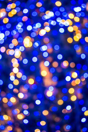 Abstract blue christmas bokeh for backgroundの写真素材
