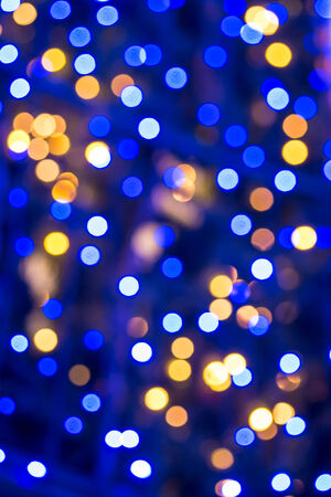 Abstract blue christmas bokeh for backgroundの写真素材