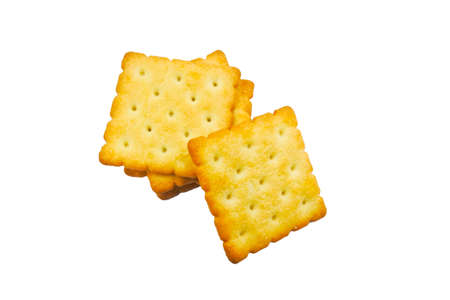 Cracker or biscuit eat with milk or coffee on white background.の写真素材