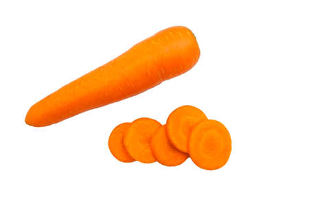 Carrots closeup top view with copy space on white background. Orange color vegetable.の写真素材