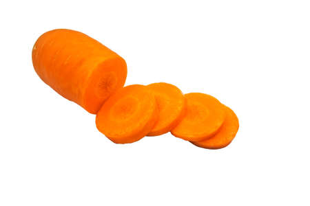 Orange carrots sliced with copy space on white background. Closeup from front view.の写真素材