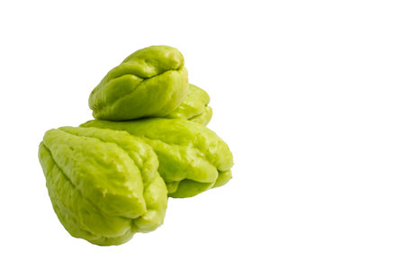 Green chayotes with copy space on white background.の写真素材