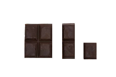 Dark chocolate compared size big and small pieces on white background.の写真素材
