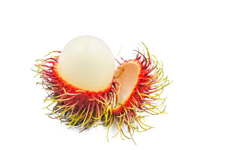 Fresh rambutan peeled closeup on white background.の写真素材
