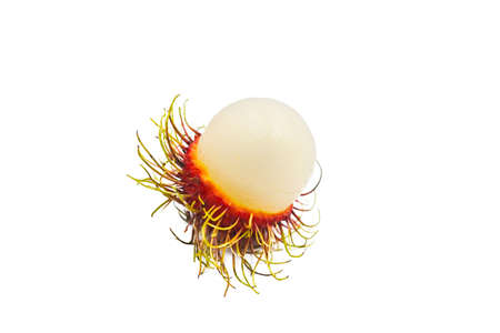 Red ripe rambutan peeled closeup on white background.の写真素材