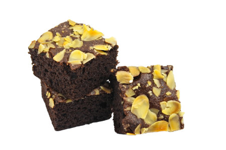 Fresh chocolate brownie closeup on white background.の写真素材