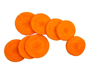 Carrots sliced circle shape on white background.の写真素材