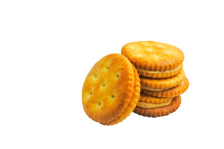 Cracker with peanut butter stacked and copy space on white background.の写真素材