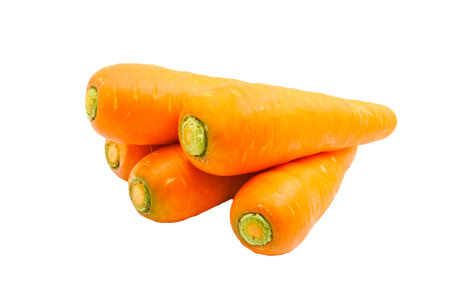 Orange carrot stacked on white background.の写真素材