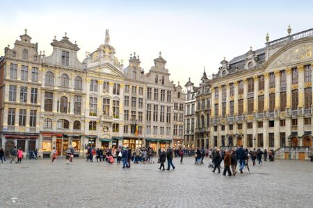 Tourists are visiting Grand Palace Square and walking along the shops and restaurant around the area, Brussels, Belgiumのeditorial素材