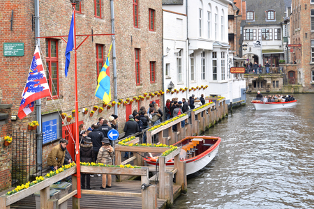 Tourists are waiting for the next round of canal city tour in Bruges, Belgium.のeditorial素材