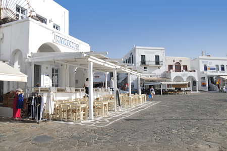 Empty restaurant during daytime along waterfront in Mykonos, Greece. Mykonos is the most popular Greek island, known for night-life island.のeditorial素材