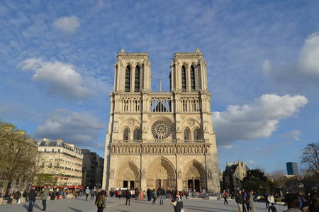 Many tourists are visiting the Cathedral of Notre Dame de Paris, Franceのeditorial素材