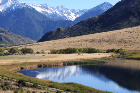 Beautiful landscape along the way of rail scenic route, Southern Island, New Zealandの写真素材