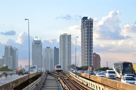 Skytrain and personal cars are main transportation in Bangkok city, Thailand.