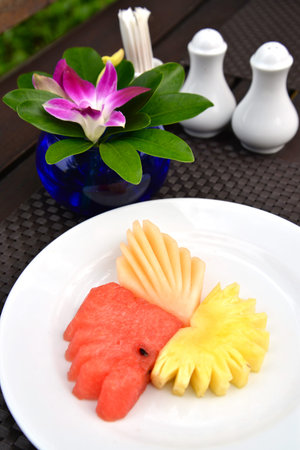 Fruit platter with cantaloupe, pineapple, water melonの写真素材