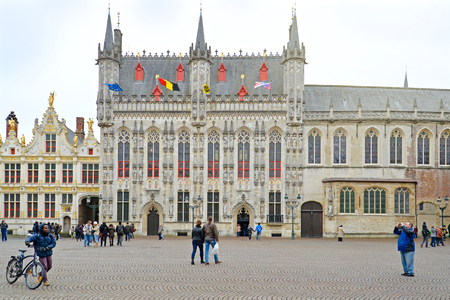 Many tourists and local people visit Castle Square in Bruges, Belgiumのeditorial素材