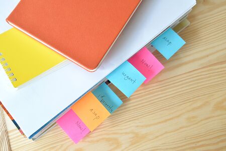 Urgent work with stack of document at officeの写真素材