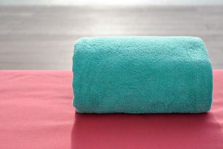 Colorful beach towel on sun loungerの写真素材