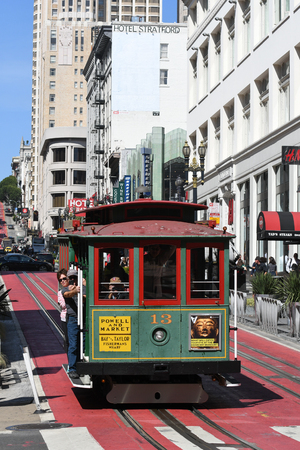 Many tourists are travelling on the San Francisco historical cable car, USA.のeditorial素材