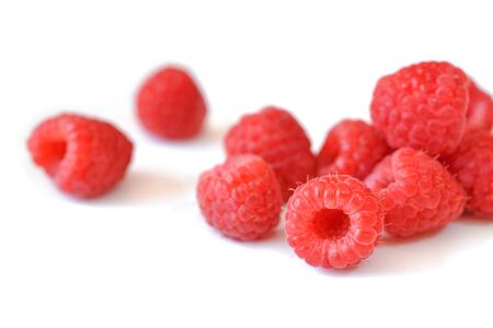 Raspberries close up on white background - isolatedの写真素材