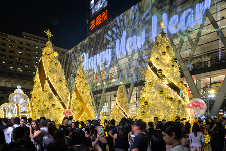Many people come to taking picture of Christmas and New Year decoration light in front of Central World department store, Bangkok Thailandのeditorial素材