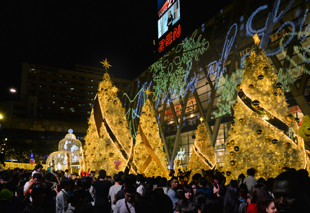 Many people come to taking picture of Christmas and New Year decoration light in front of Central World department store, Bangkok Thailandのeditorial素材