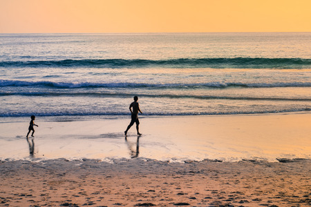 Phuket, Thailand - July 23, 2017: People enjoy the beach during sunset at Surin Beach, Phuket, Thailandのeditorial素材