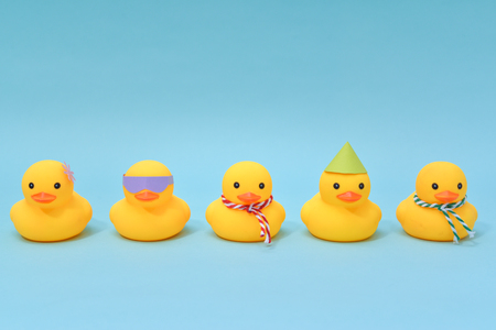 Diversity concept, Difference rubber ducks manage to line upの写真素材