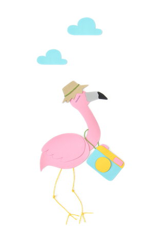 Travel flamingo paper cut on white background - isolatedの写真素材