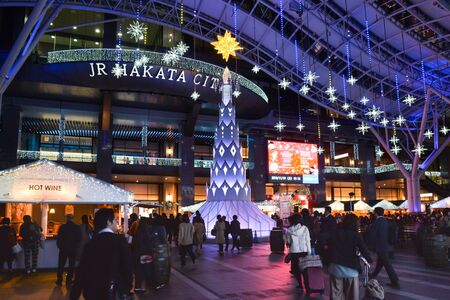 Fukuoka, Japan- November 19, 2018: Many people visit the light up in front of JR Hakata city, Fukuoka, Japanのeditorial素材