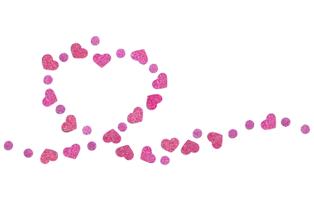 Pink glitter confetti paper cut background - isolatedの写真素材