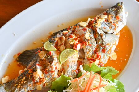 Steamed fish with lime - Thai foodの写真素材