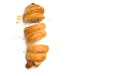 Sausage roll on white background - isolated
