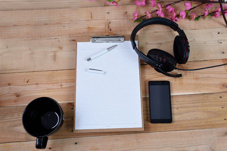 Blank diary on wood backgroundの写真素材